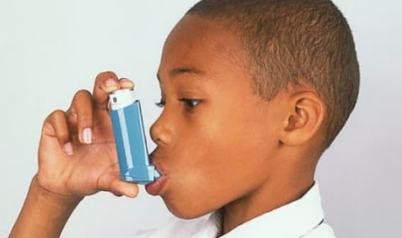 Image of kid with inhaler